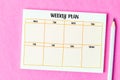 The Blank weekly plan notice block on pink colour background. Empty schedule and a pencil