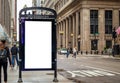 Blank billboard at bus stop for advertising, Chicago city buildings and street background