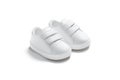 Blank white baby shoes pair mockup, side view Royalty Free Stock Photo