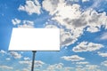 Blank white billboard on a cloudy sky background Royalty Free Stock Photo