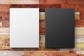 Blank white and black diary on the wooden table
