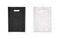 Blank white and black plastic bag mockup with space for your design and branding. Royalty Free Stock Photo