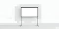 A blank white board with a black frame standing against a white wall in a bright room space Royalty Free Stock Photo