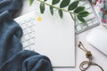 Blank white board with computer keyboard and mouse. Top view wit Royalty Free Stock Photo