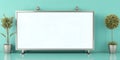Blank white board with silver frame and two plants against a teal colored background Royalty Free Stock Photo