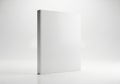 Blank white book standing upright isolated on white background Royalty Free Stock Photo