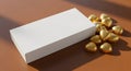 Blank White Box with Golden Heart Chocolates Royalty Free Stock Photo