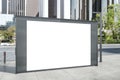 Blank white bus stop billboard on city backdrop. Commercial and ad concept. Mock up, 3D Rendering