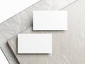 Blank white business card mockup on marble background 3d render illustration for mock up Royalty Free Stock Photo