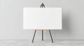 Blank White Canvas On Easel In Minimalist Studio. Ideal For Art Projects And Creative Expression Royalty Free Stock Photo