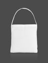 Blank white canvas shopping tote bag isolated on gray background