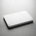 Blank white card on textured surface Royalty Free Stock Photo