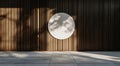 Empty white circle banner hanging on a wooden slat wall with sunlight casting shadows Royalty Free Stock Photo