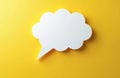 Blank white cloud shaped speech bubble waits for text on bright yellow background. This offers empty space for your message. Royalty Free Stock Photo