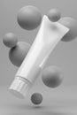 Blank white cosmetic tube on gray background Royalty Free Stock Photo