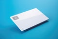 Blank white credit card with microchip on blue, copy space, created using generative ai technology Royalty Free Stock Photo