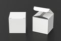 Blank white cube gift box with open and closed hinged flap lid on black background. Royalty Free Stock Photo
