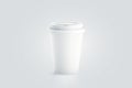 Blank white disposable paper cup with plastic lid mock up