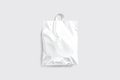 Blank white full loop handle plastic bag mockup, gray background