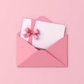 Blank white gift card with pink ribbon bow in pink envelope on pink pastel color background Royalty Free Stock Photo