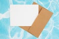 Blank white greeting card with and a brown envelop Royalty Free Stock Photo