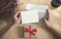 Blank white greeting card with envelope and gift box. for mockup template. vintage tone. Royalty Free Stock Photo