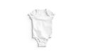 Blank white half sleeve baby bodysuit mockup lying, top view Royalty Free Stock Photo