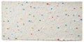 Blank white hand-made textured paper background with colored particles Royalty Free Stock Photo