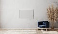 Blank white horizontal poster frame mock up on gray wall in modern living room interior with dark blue armchair and wooden floor,