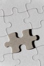 Blank white jigsaw puzzle and missing piece Royalty Free Stock Photo