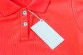 A blank white label or tag attached on shirt Royalty Free Stock Photo