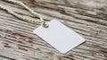 Blank White Label Tag with String on Simple Background. Royalty Free Stock Photo