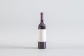 Blank white label wine bottle on light background. Alcohol, winery, beverage and elegance concept. Mock up Royalty Free Stock Photo