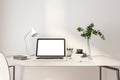 Blank white laptop screen on modern interior design home office work place. 3D rendering, mock up Royalty Free Stock Photo