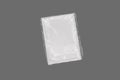 Blank white magazine packed in plastic bag. plastic wrapped magazine mockup isolated on a grey background