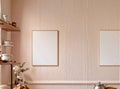 A blank white menu poster placed on a soft pastel-colored wall inside a charming bakery, perfect for creative menu displays Royalty Free Stock Photo