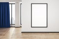 Blank white mock up poster on white wall in modern living room with wooden floor and blue curtain Royalty Free Stock Photo