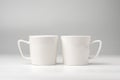 Blank white mugs mock up on white background