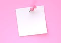 Blank white note paper with pink push pin isolated on pink pastel color wall background Royalty Free Stock Photo