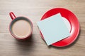 Blank white notebook open, eyeglass, pen and cup of coffee on the desk Royalty Free Stock Photo