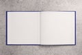 Blank white notepad on concrete surface