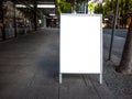 Blank white outdoor advertising stand/sandwich board mock up template. Royalty Free Stock Photo