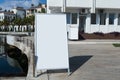 Blank white outdoor advertising stand sandwich board mock up template Royalty Free Stock Photo