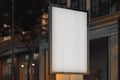 Blank white outdoor banner stand at evening time in the city, 3d rendering.