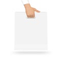 Blank white paper bag mock up holding in hand. Empty plastic pac