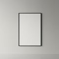 A blank white paper is framed within a simple, black rectangular frame. Positioned Royalty Free Stock Photo