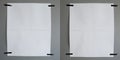 Blank White Paper on Gray Wall Secured with Tape, Ready for Writing or Drawing, Minimalist Design for Creative Expression Royalty Free Stock Photo