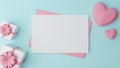 Blank white paper is placed on pink paper with pink heart and Close white gift box with pink ribbon on cyan background. Valentine
