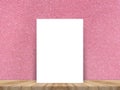 Blank white paper poster at tropical plank wooden floor and paper wall, Template mock up for adding your content,leave side space Royalty Free Stock Photo