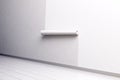 Blank white paper roll hanging on wall mockup, side view